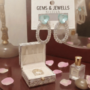 Aquamarine Heart Crystal Oval Hoop Statement Earrings displayed on a Gems & Jewels card.