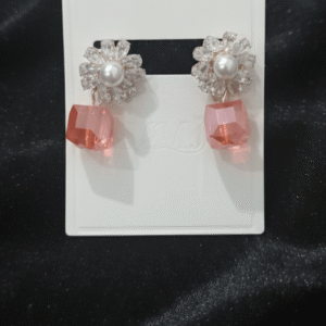 Crystal Flower Pearl Studs with Peach Cube Drop Earrings on a Gems & Jewels display card.