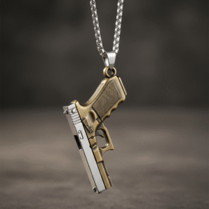 Two Tone Metallic Gun Pendant Necklace hanging against a textured background.