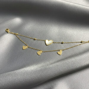 Gold Heart Beaded Chain Bracelet for women with elegant heart charms and decorative gold beads