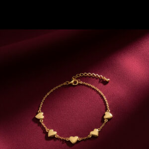 Gold Heart Charm Bracelet for women with polished heart charms on a delicate gold chain