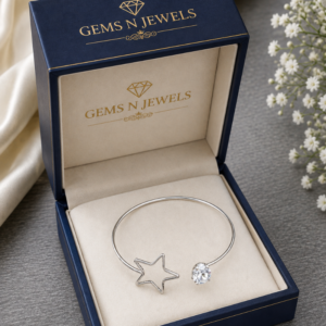 Elegant silver open cuff bracelet featuring a star design and sparkling crystal stone for women.